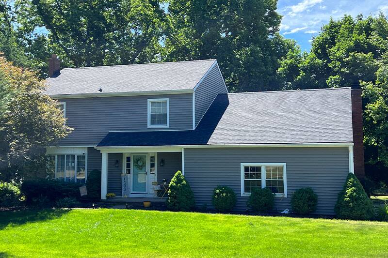 Choosing a Shingle Color for Your Michigan Home: Brick, Siding, Trees and Gray Skies