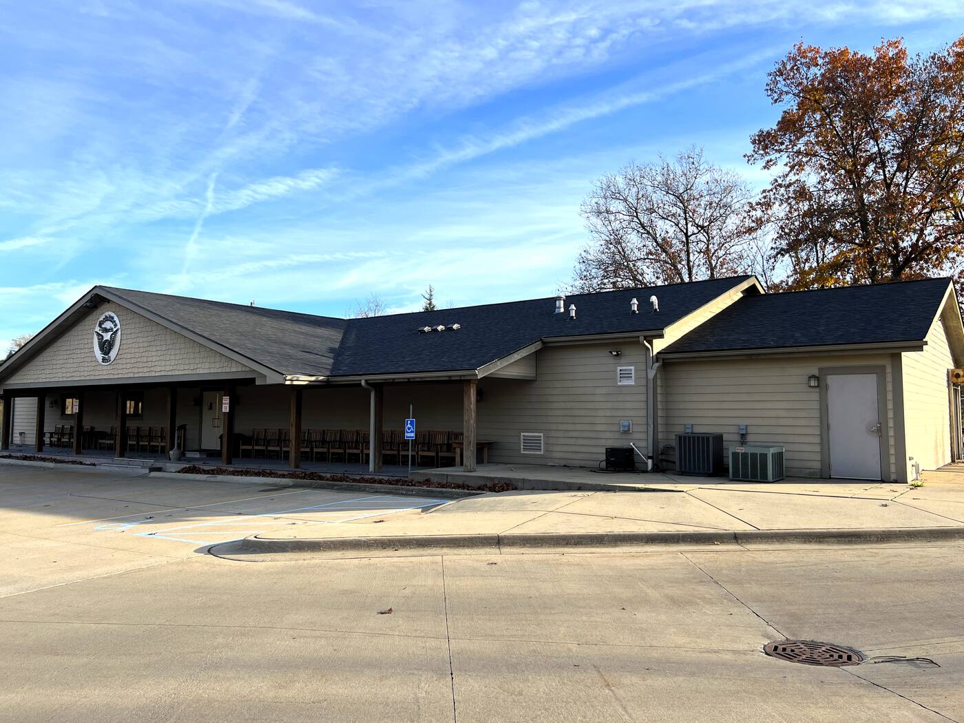 Commercial building with a completed low-slope and shingle roof