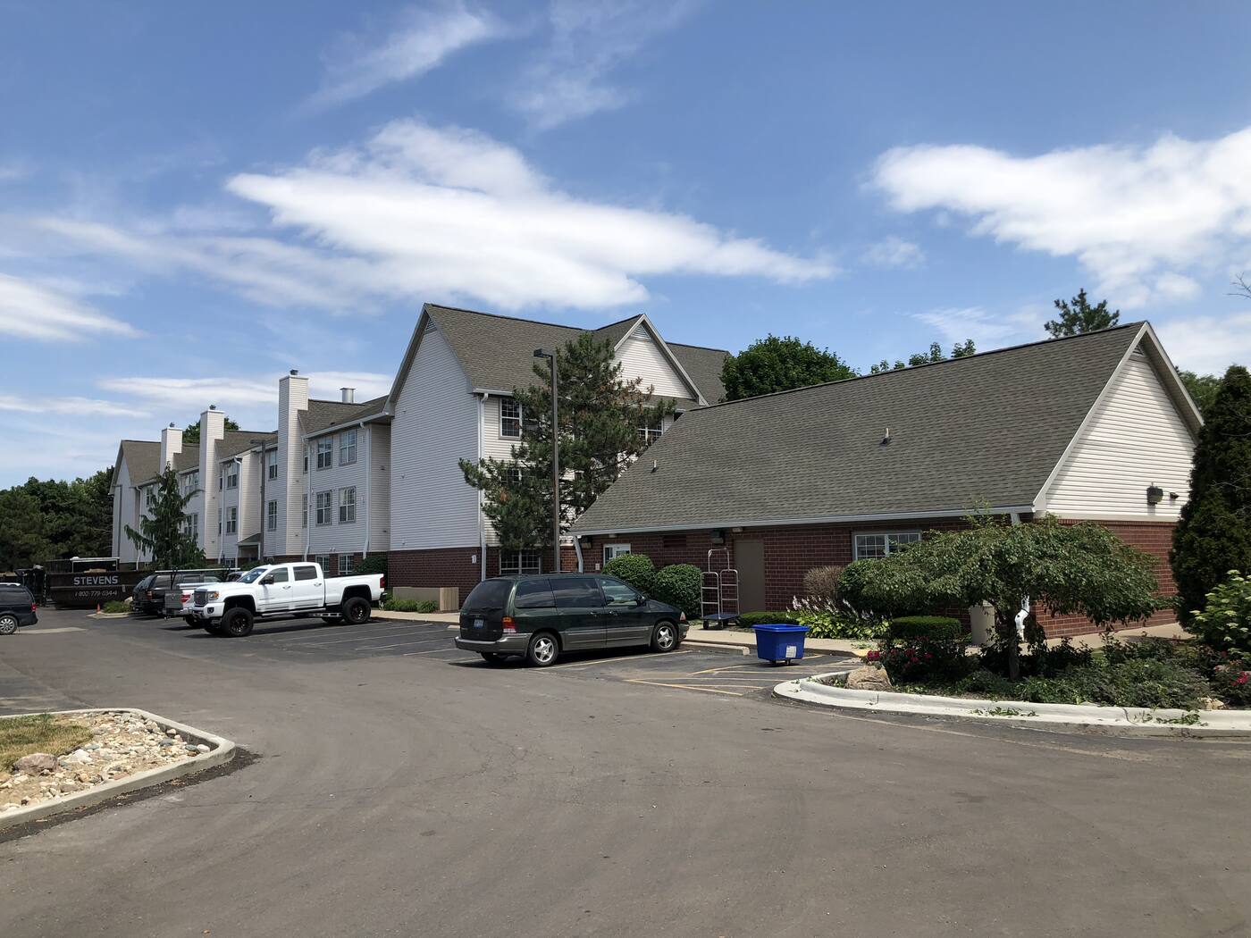 Condominium complex with a full roof replacement completed
