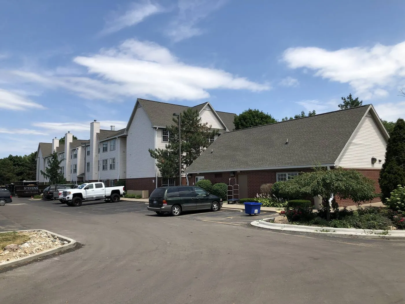 Condominium complex with a full roof replacement completed