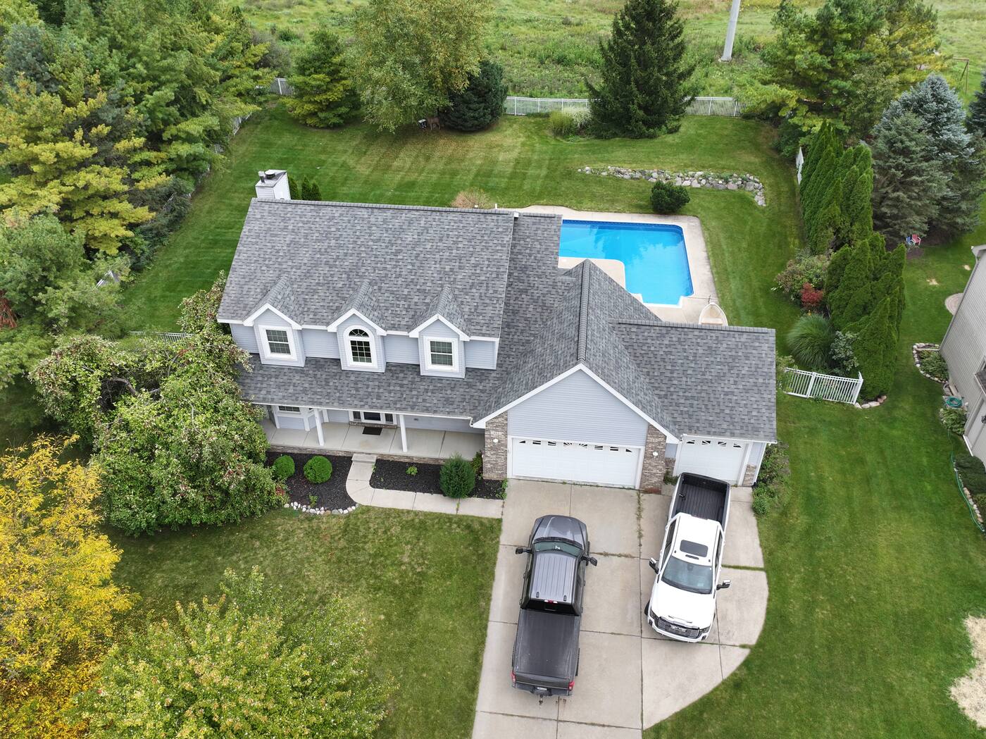 Roofing a Lake Home in Livingston County: What Changes When Water Is 100 Feet Away