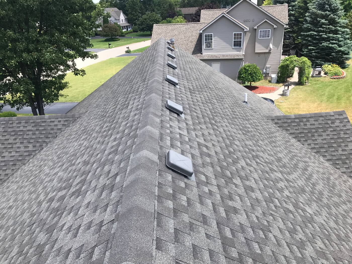 Ridge vent installed along the peak for proper attic ventilation