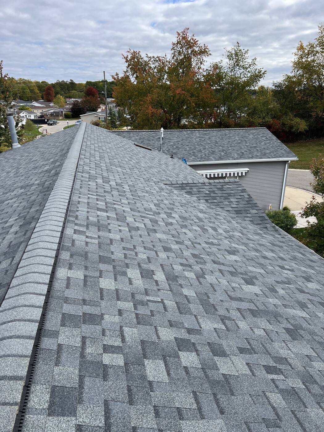 Ridge and hip lines running clean across a finished roof