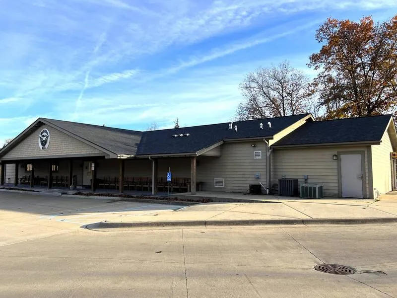 Commercial building with a completed low-slope and shingle roof