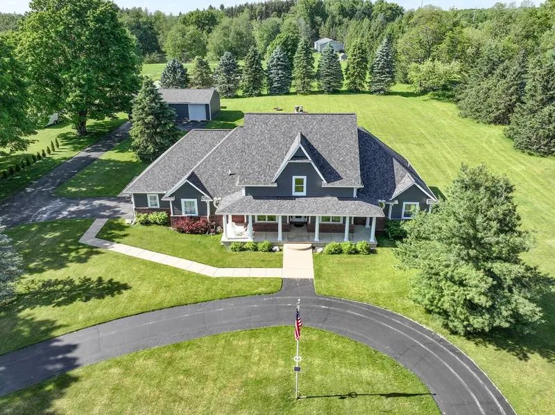 Drone view of a new roof on a craftsman-style home
