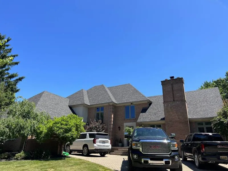 Completed replacement on a home with a full-height masonry chimney