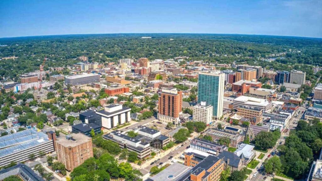 An aerial view of the cityscape showcases various buildings